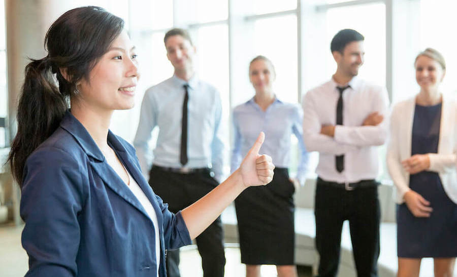 confident Singaporean woman executive small confident Singaporean woman executive who can communicate with professional presence